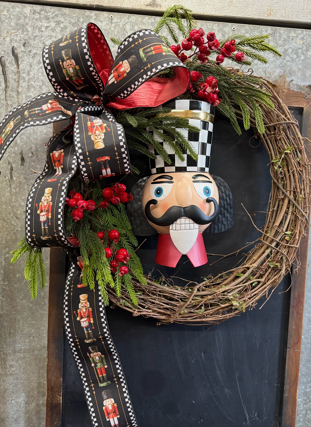 24 inch Grapevine Wreath with Large Metal Nutcracker