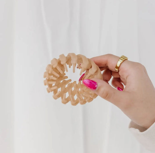 Shop ANDi Light Brown Bird Nest Expanding Hair Claw