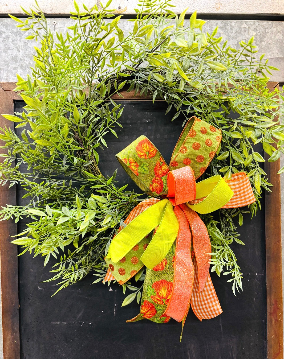 24" Ruscus Wreath with Green & Orange Fall Bow