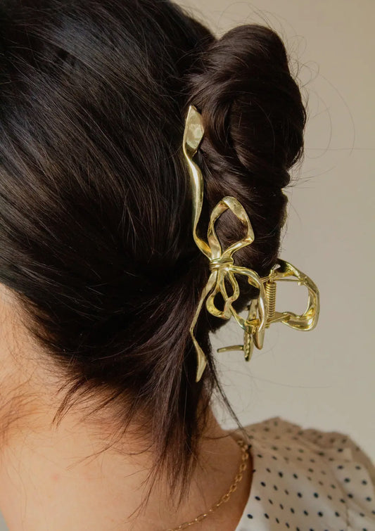 Shop ANDi Gold Bow Squiggle Claw Clip